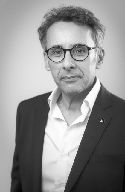 Tewfik M